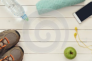 Fitness concept over wooden background. top view image