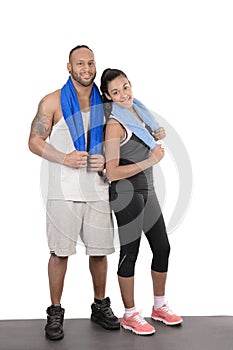 Fitness couple with towels