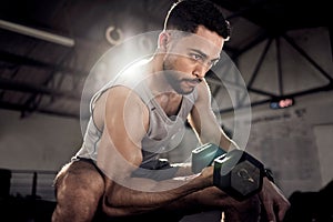 Fitness, dumbbell or strong man training, exercise or workout for powerful arms or muscles at gym. Concentration curls