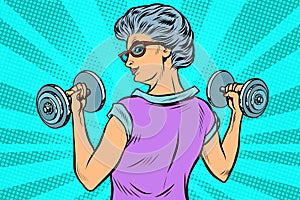 Fitness dumbbells sport activity Woman grandmother pensioner elderly lady