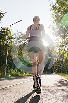 Fitness enthusiast on a sunny morning run