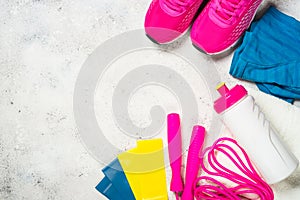 Fitness equipment flat lay image on white background.