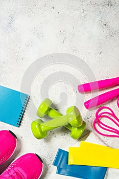 Fitness equipment flat lay image on white background.