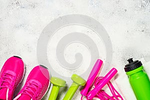 Fitness equipment flat lay image on white background.