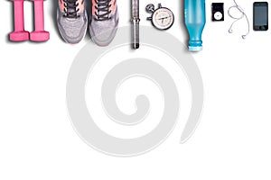 Fitness equipment on pure white background. Pink dumbbells and light shoes to running.