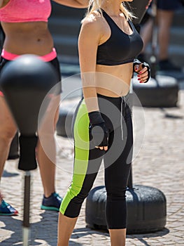 Fitness and Exercising Concept: Girls Workout with Speed Ball and Free Standing Boxing Punch Bag