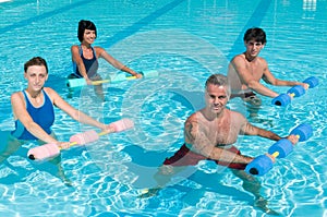 Fitness exercising in swimming pool