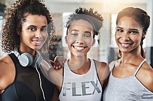 Fitness fanatics and best friends. a group of happy young women enjoying their time together at the gym.