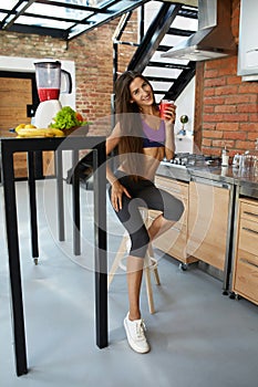 Fitness Food. Healthy Fit Woman Drinking Fresh Juice. Nutrition