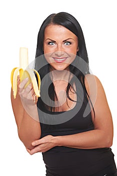 Fitness girl with banana isolated on white