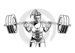 Fitness girl with heavy barbell photo