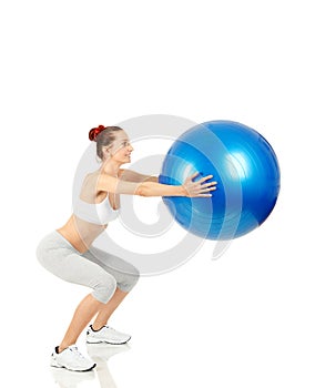 Fitness girl holding exercising ball