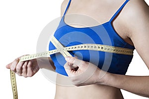 Fitness girl measured her breast