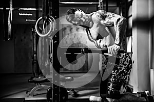 Fitness girl with shaker posing in the gym