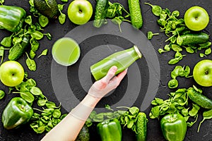 Fitness greeny drink with vegetables on dark background top view mock-up