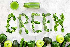 Fitness greeny drink with vegetables on stone background top view mock-up