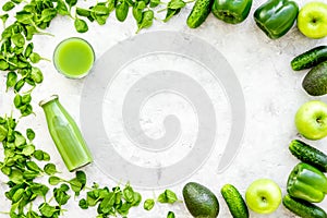 Fitness greeny drink with vegetables on stone background top view mock-up