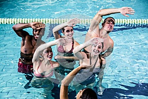 Fitness group doing aqua aerobics