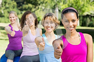 Fitness group sitting on exercise balls