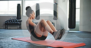 Fitness, gym and woman with medicine ball for training, core exercise and cardio workout on yoga mat. Sports, personal