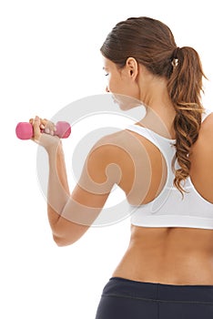 Fitness, gym and woman in studio with dumbbell for workout, muscle training and body building. Exercise, power and