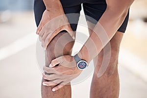 Fitness, hands and man with knee pain in road for training with wound, mistake or anatomy, emergency and risk outdoor