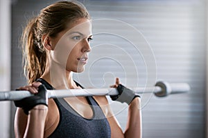 Fitness, health and woman training with barbell for weight lifting competition, muscle endurance and strength workout