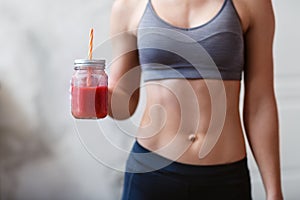 Fitness and healthy lifestyle concept with detox smoothie