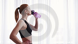 fitness hydration water balance woman drinking