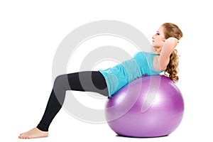 Fitness instructor,shows exercises with a large ball.