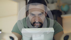 Fitness man on a bicycle doing spinning at the gym.