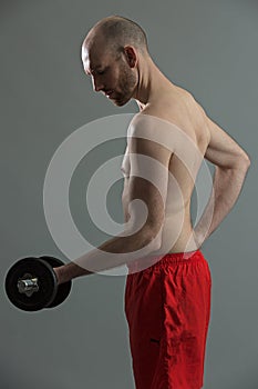 Fitness man doing strength training