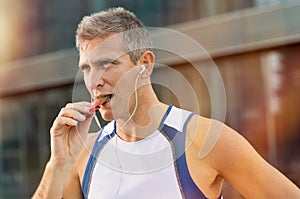 Fitness Man Eating Snack Food