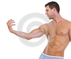 Fitness man with muscular body gracefully posing