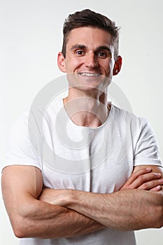 Fitness man portrait cute in a white tank