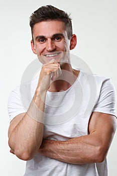 Fitness man portrait cute in a white tank