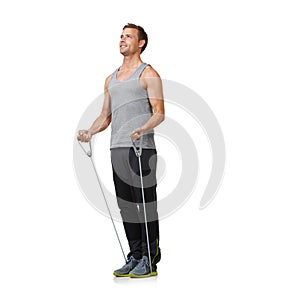 Fitness, man and resistance band to workout in studio, gym and weight training for strong muscles. Sports person