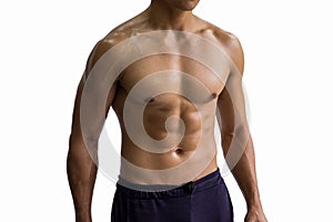 Fitness man showing six pack