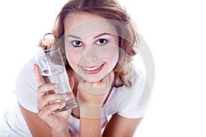 Fitness model drinking a glass water