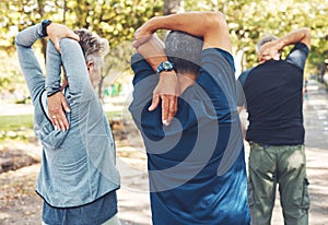 Fitness, nature and senior people doing stretching exercise before cardio training in a park. Health, wellness and
