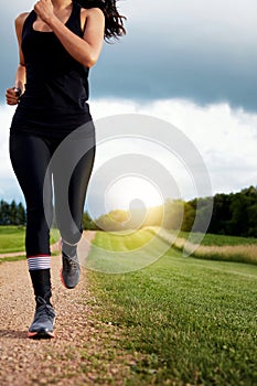 Fitness is not a destination, its a way of life. an unidentifiable young woman out for a run on a beautiful day.