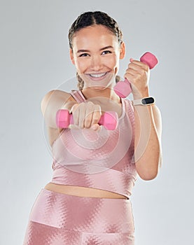 Fitness, portrait and woman with dumbbell isolated on studio white background for health, exercise and gym power
