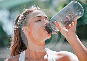 Fitness, relax and drinking water with woman in outdoor for sports, workout and health. Wellness, exercise and summer