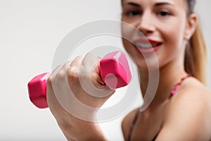 Fitness routine, in-focus weights, improves day photo