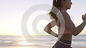 Fitness, running and woman on beach with energy, speed and focus training for marathon, body goals or progress with