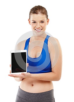 Fitness, showing and girl with tablet, portrait and sportswear for exercise, studio and training. White background