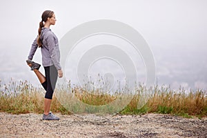 Fitness, space and stretching with runner woman outdoor on mountain trail for cardio workout. Exercise, nature and view