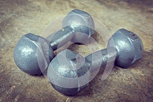 Fitness sport of bodybuilding background, metal dumbbell