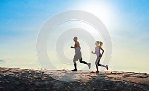 Fitness sport couple running jogging outside