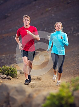 Fitness sport couple running jogging outside